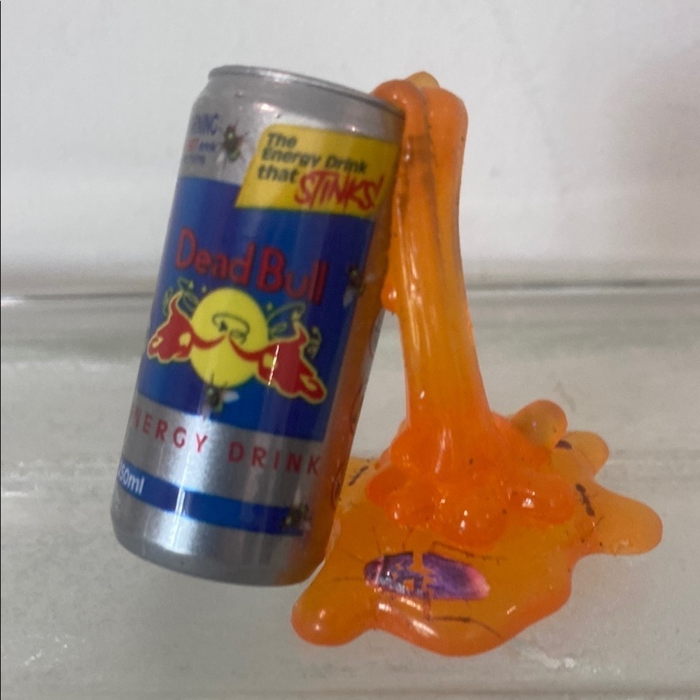 Dead Bull Energy Drink Can with Orange Slime